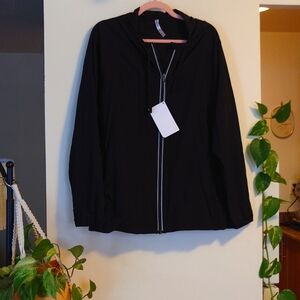 Zip up jacket with hood and zip pockets